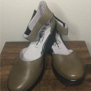 NWOT Fly London Yand size 9 (EU 40) tan leather ankle strap wedge shoe.